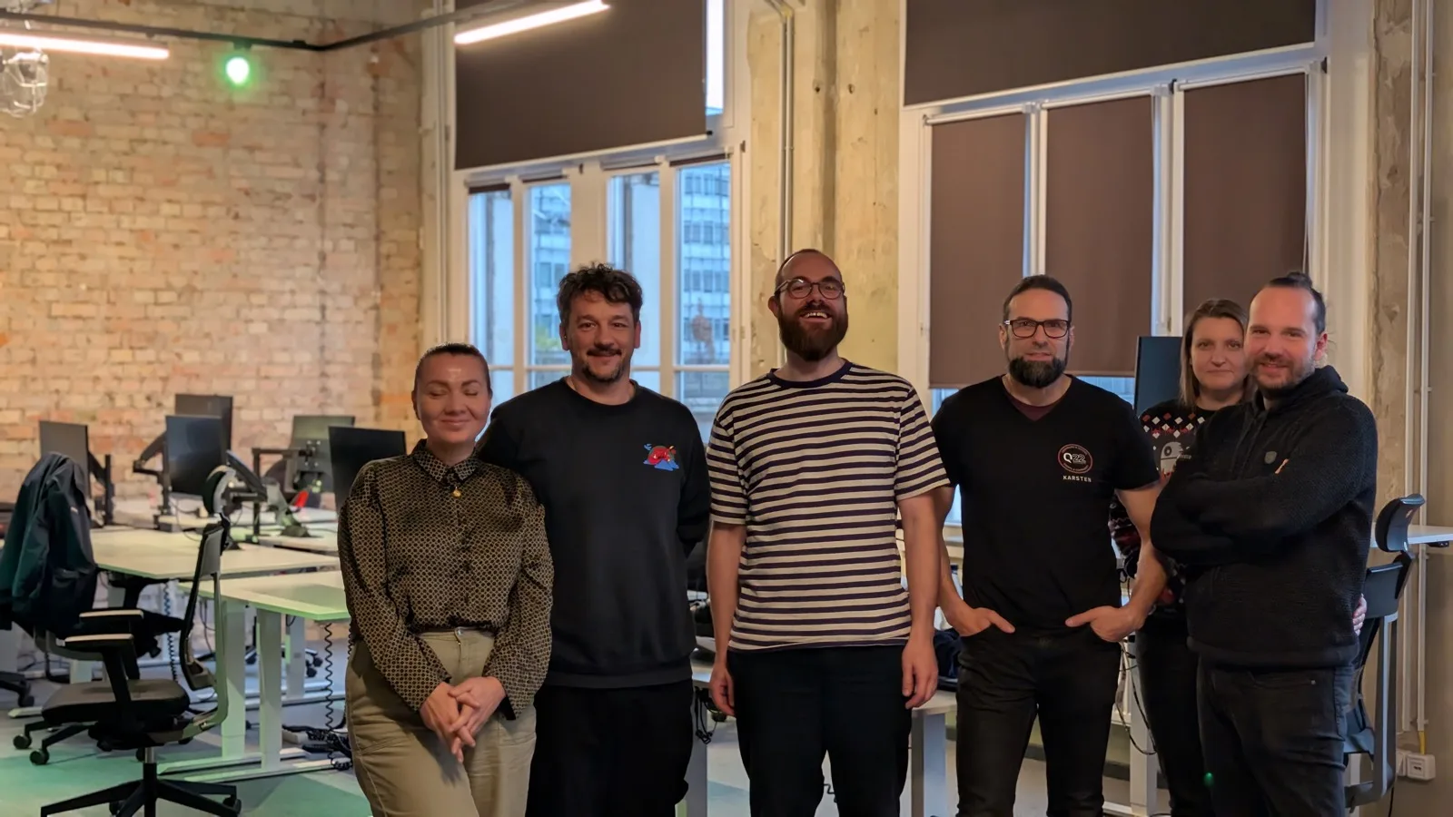 Workshopgruppe in einem ostec Arbeitsraum